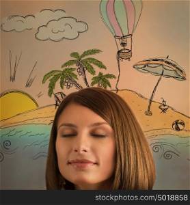 Young woman dreaming about her summer vacation on tropical island