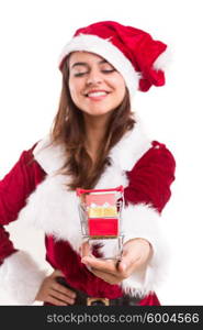 Young woman dress in Christmas costume, presenting your product