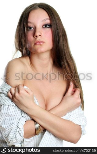 Young woman dressed in white shirt sitting on white isolated