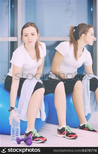 young woman drink water at fitness workout training at sport club. woman drink water at fitness workout