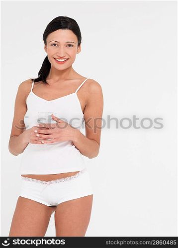 Young Woman Drinking Mineral Water