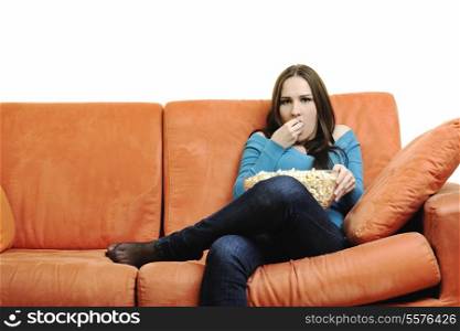 young woman eat popcorn, watching movies and eat popcor isolated on white