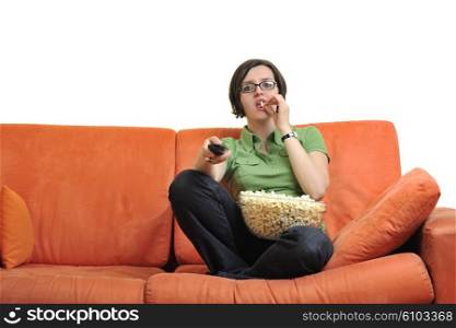 young woman eat popcorn, watching movies and eat popcorn at modern home living room isolated on white background