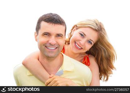 young woman embraces man behind