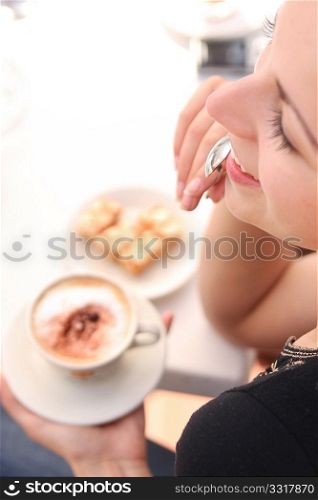 Young woman enjoying coffee time