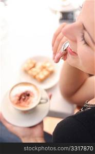 Young woman enjoying coffee time