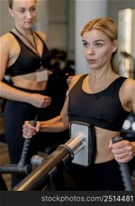 young woman exercising gym
