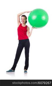 Young woman exercising with swiss ball