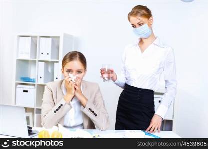 Young woman feeling unwell and sick in office