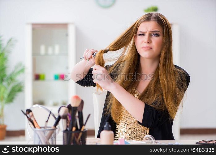 Young woman frustrated at her messy hair