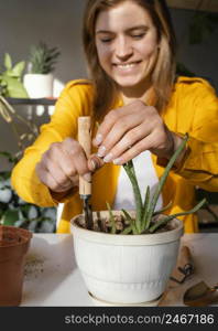 young woman gardening home