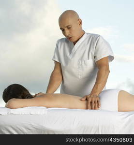 Young woman getting a back massage