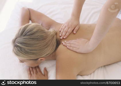 Young woman getting a back massage