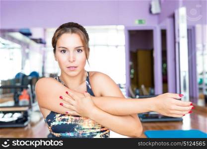 Young woman getting into shape with one more training session