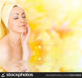 Young woman getting ready for the spa treatment on autumn background