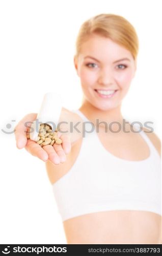 Young woman girl holding vitamins pills. Health care. Healthy lifestyle nutrition concept. Isolated on white background. . Woman girl holding vitamins pills. Health care.