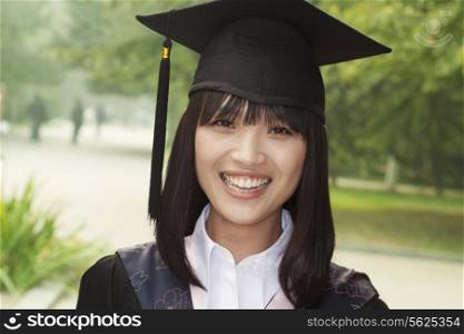 Young Woman Graduating From University, Close-Up Portrait