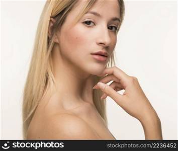 young woman hand chin pose
