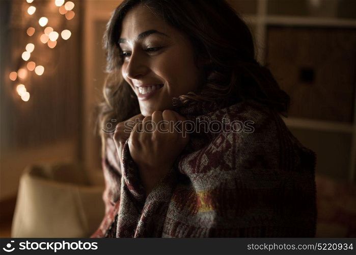 Young woman having a warm christmas time