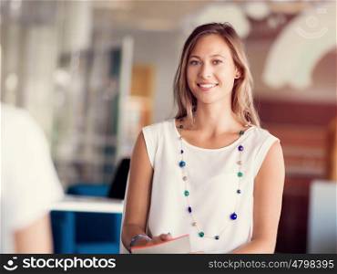 Young woman having an interview in office