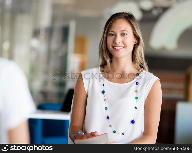 Young woman having an interview in office