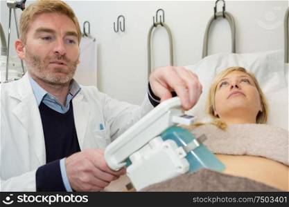 young woman having cool sculpting therapy