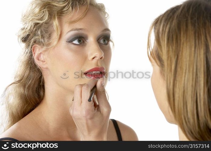 Young Woman Having Her Lipstick Applied
