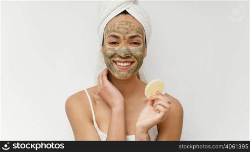 young woman having homemade mask her face 2