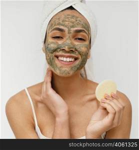 young woman having homemade mask her face
