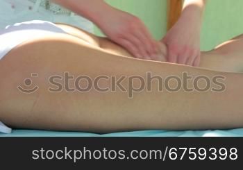 Young Woman Having Massage Outside