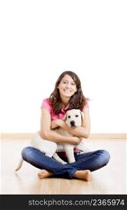 Young woman holding a beautiful and cute dog