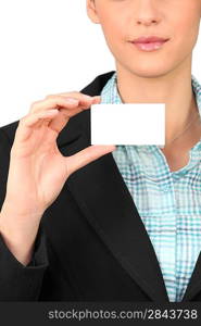Young woman holding a blank business card