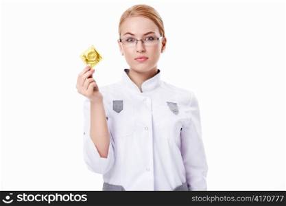 Young woman holding a condom