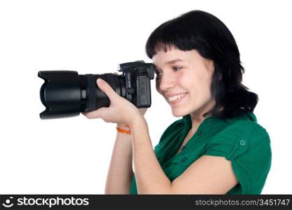 Young woman holding a photo camera a over white background