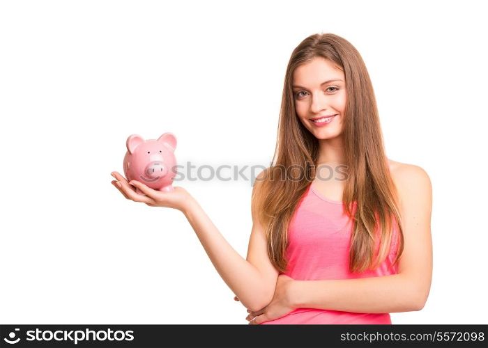 Young woman holding a piggy bank (money box) - savings concept