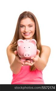 Young woman holding a piggy bank (money box) - savings concept