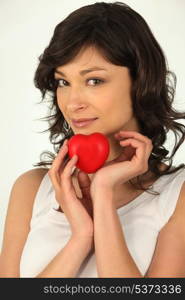 young woman holding a plastic hearth in her hand