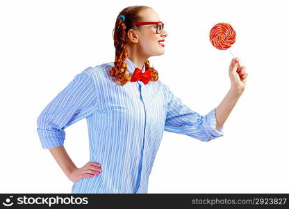 Young woman holding candy