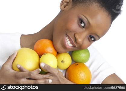Young Woman Holding Citrus Fruit In Studio