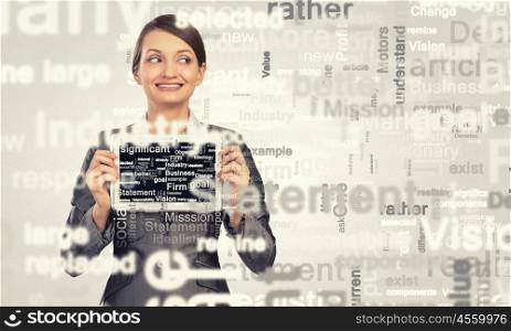 Young woman holding in hands tablet pc. Woman with tablet