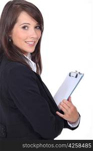 Young woman holding notepad