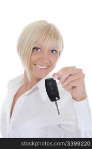 young woman holds the key to the car. Isolated on white background