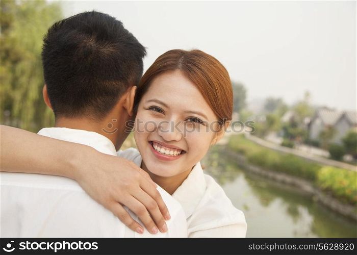 Young Woman Hugging Her Boyfriend