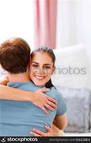 Young woman hugging her husband&#xA;