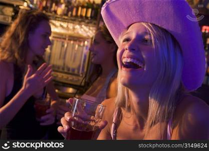 Young woman in a bar