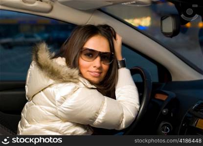 young woman in a car