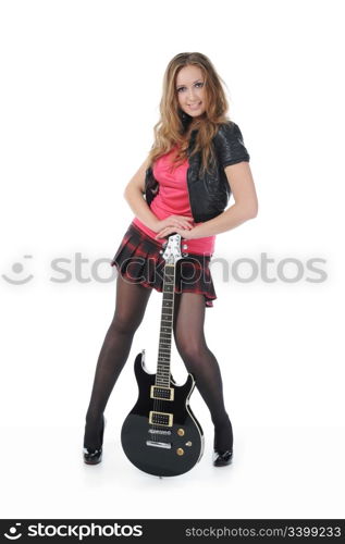 young woman in a full-length with a black guitar in his hand. Isolated on white background