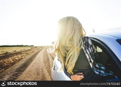 Young woman in a road trip enjoying the journey                               