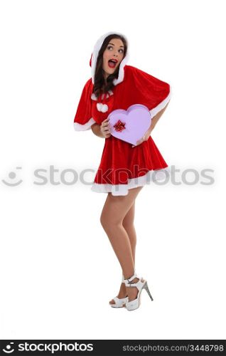 Young woman in a saucy Santa outfit