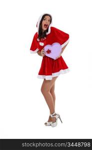 Young woman in a saucy Santa outfit